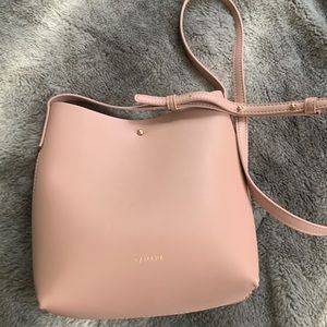 Brand new and never used Samara pale pink crossbody